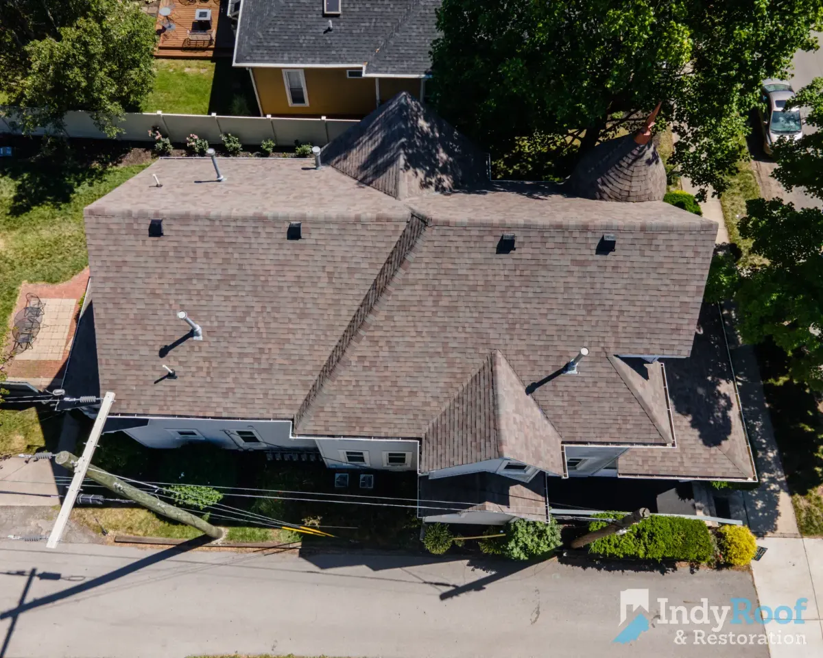 Architectural shingles with ridge vent completed in Chatham Hills, Nora, IN (May 2025)