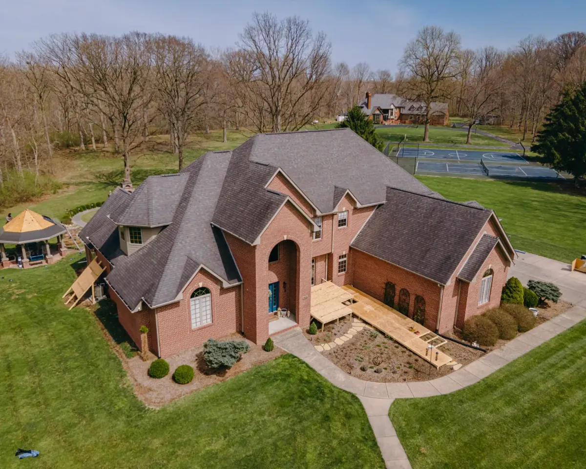 Architectural asphalt shingles before restoration in Viking Meadows, Nora, IN